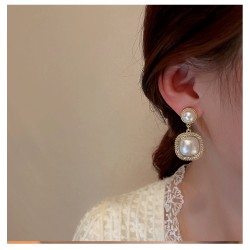 Boucles D'oreilles EW