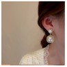 Boucles D'oreilles EW